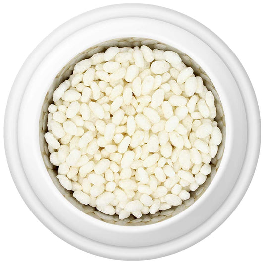 Country Pursuit Puffed Rice dog food mixer in a bowl